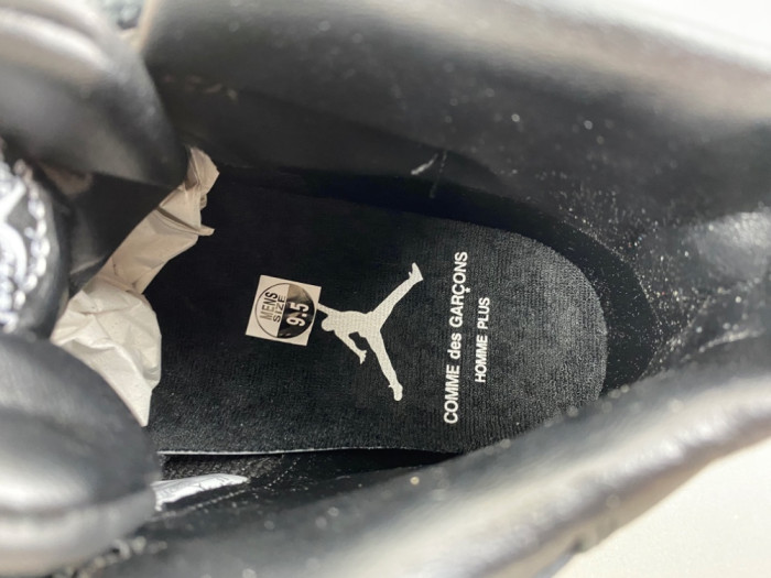 The CDG x Air Jordan 11 SP IV7639-001